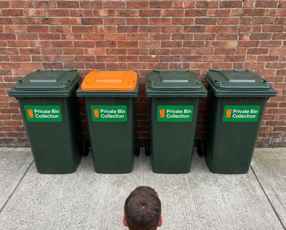 Neatly arranged bins after private collection in Arundel